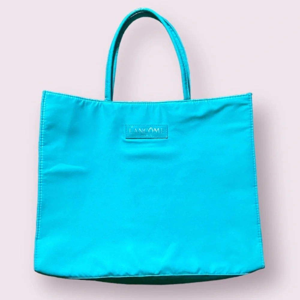 Lancome Tote Bag in Turquoise with Black and White Polka Dot Lining